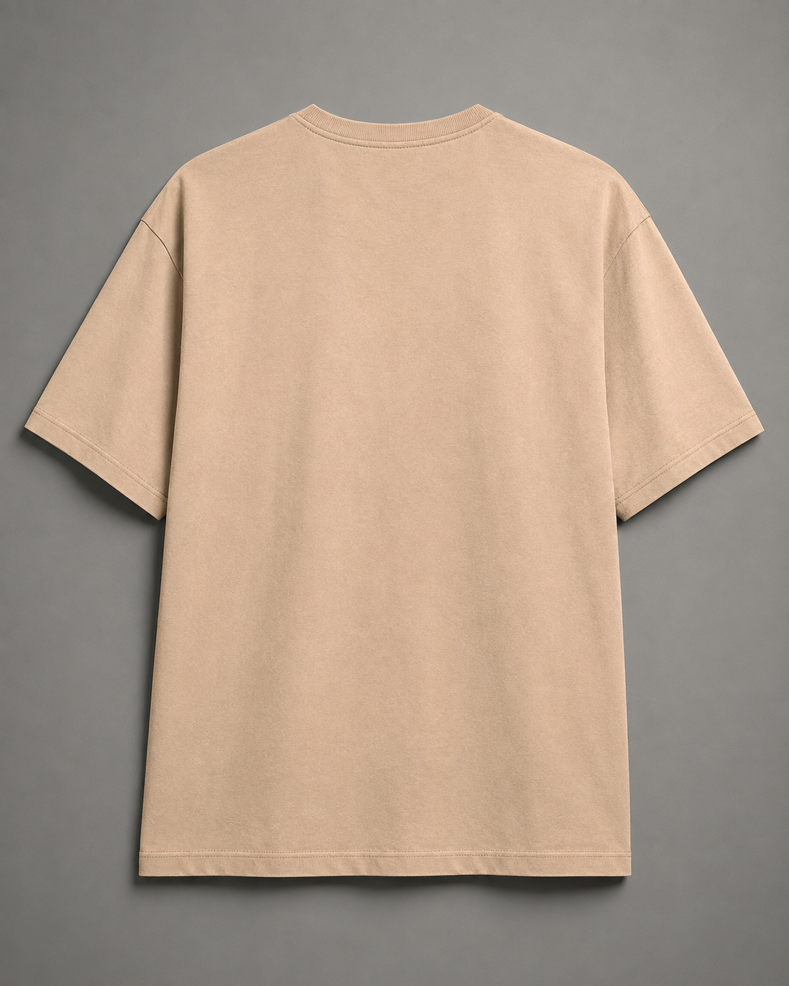 A plain beige short-sleeve t-shirt shown from the back, laid flat against a solid gray background.