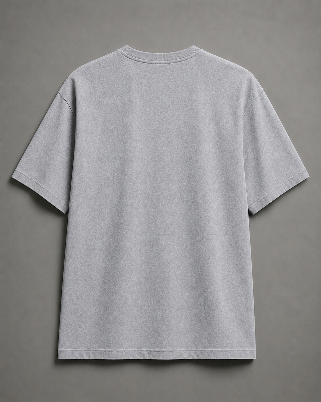 A light gray short-sleeve crewneck t-shirt shown from the back, laid flat against a neutral gray background.