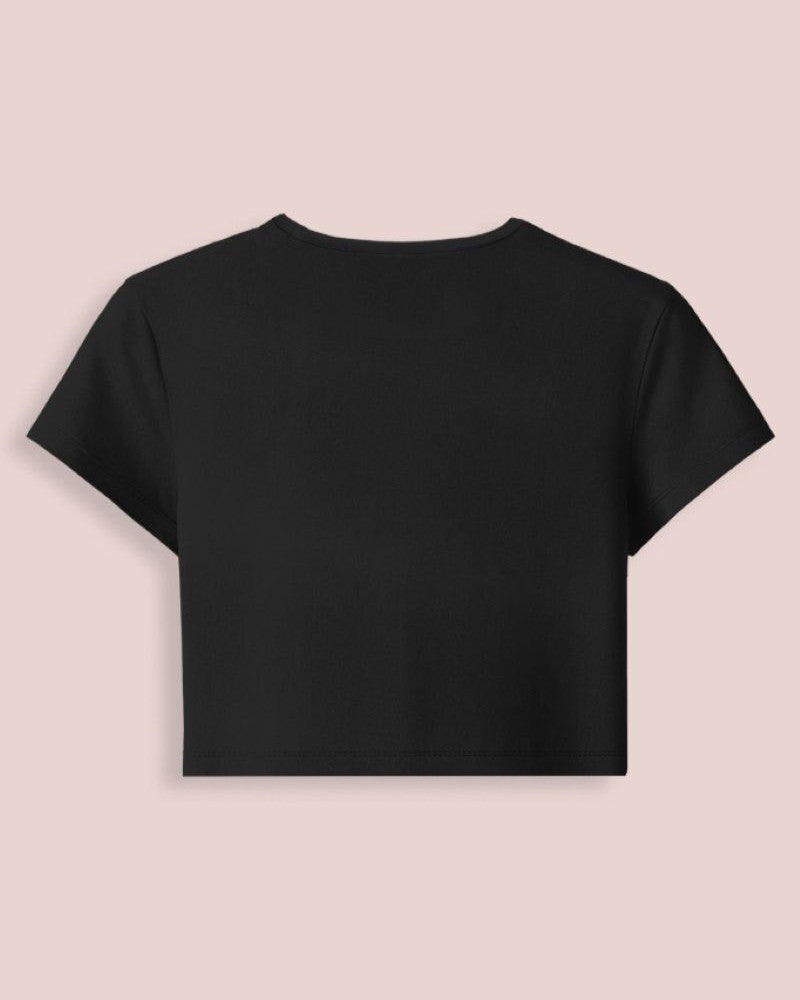 Black t-shirt with white leaf design on a white background