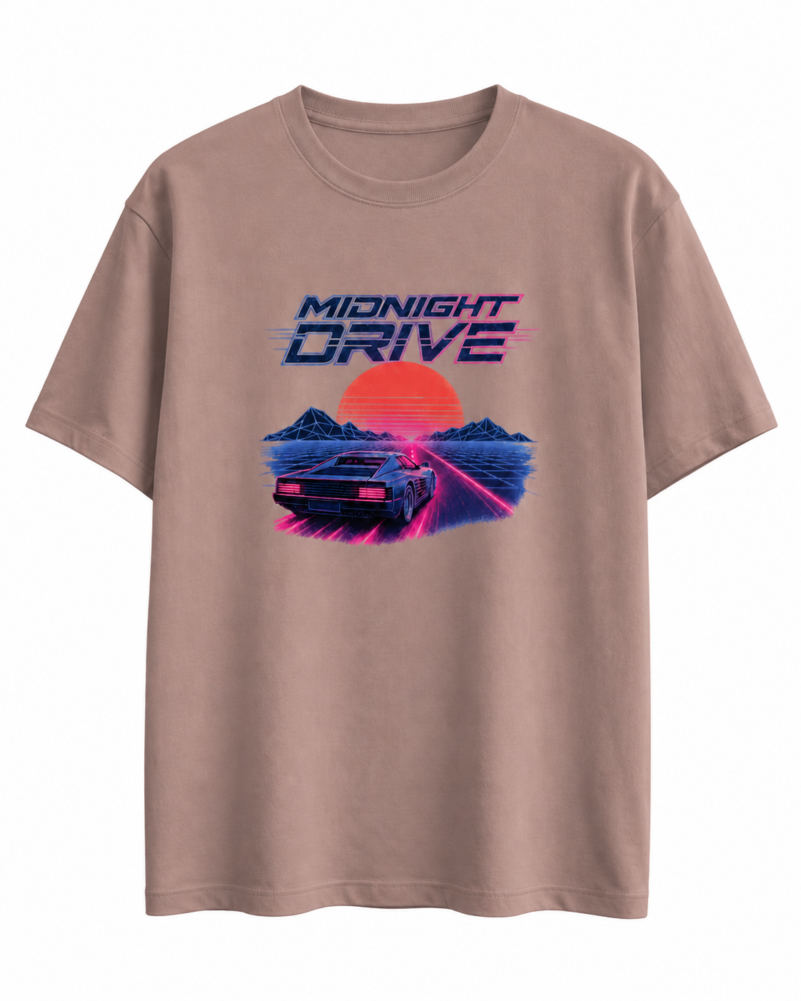 A light brown crewneck t-shirt featuring a retro 80s synthwave graphic with the text 'MIDNIGHT DRIVE' and an illustration of a car, mountains, and a sunset.