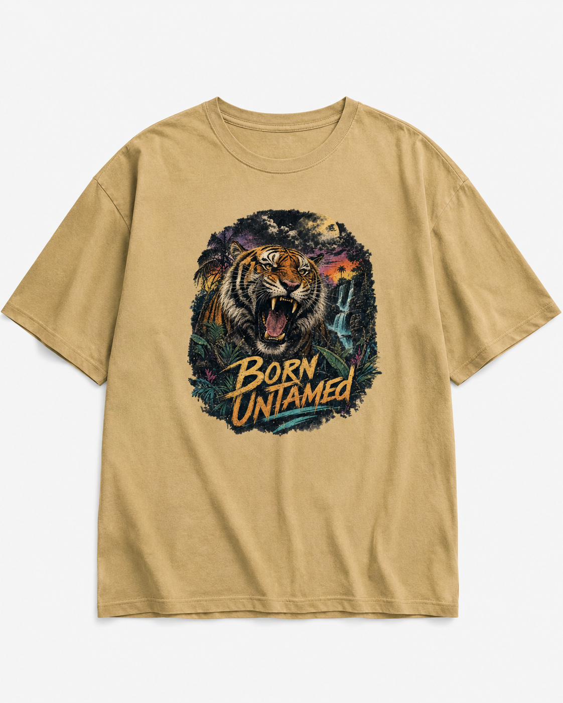 A tan crewneck t-shirt featuring a large graphic print of a roaring tiger and the text 'BORN UNTAMED' on the front, displayed against a light gray background.