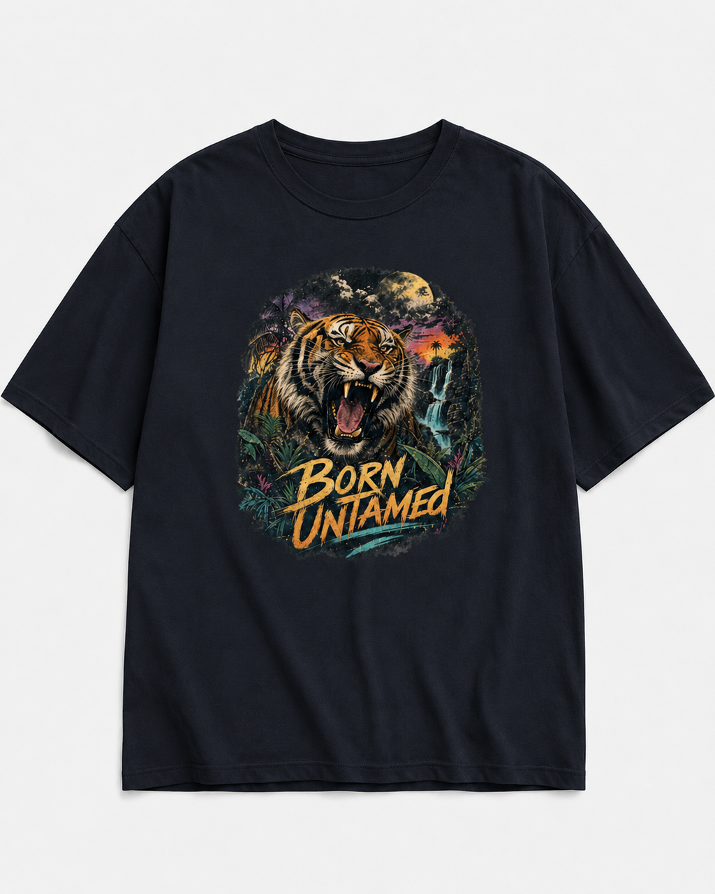 A black short-sleeve crewneck t-shirt featuring a large graphic print of a roaring tiger in a jungle scene with the text 'BORN UNAMED' in yellow and orange, displayed on a light gray background.