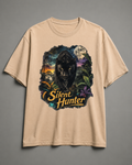 A beige crewneck t-shirt featuring a large graphic print of a black panther with the text 'Silent Hunter' in yellow, set against a dark jungle scene with a full moon.